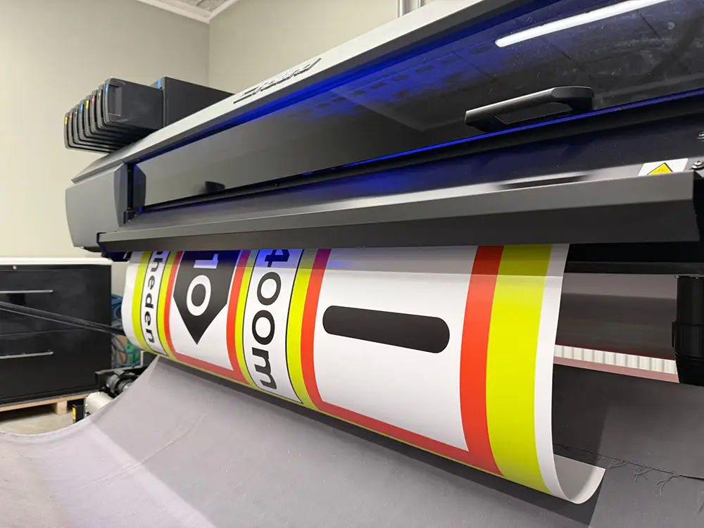 Close-up of the TrueVIS LG in action printing road signage graphics