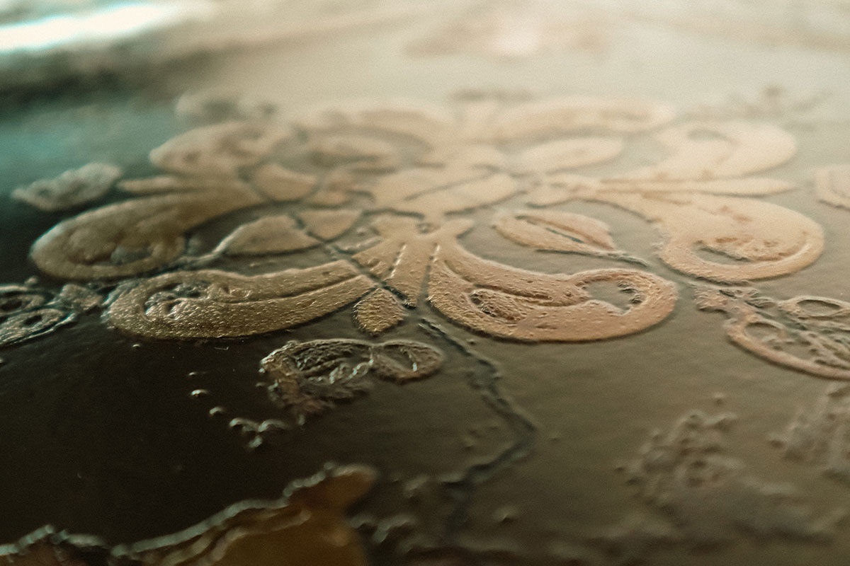 An embossed wall decor printed with DIMENSE DA-640