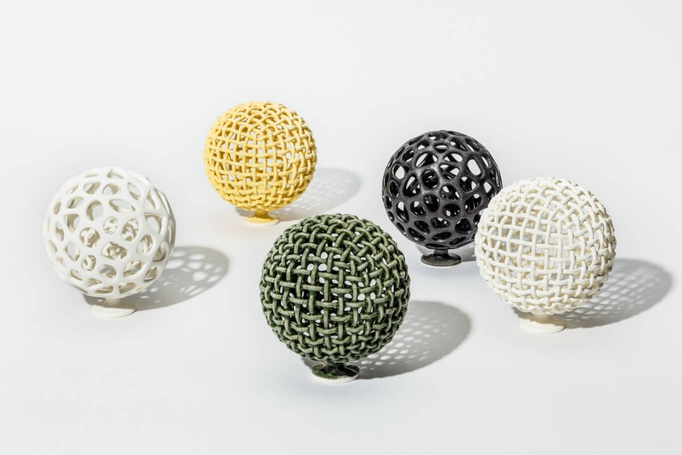 Net patterned sphere objects with various colored glazes