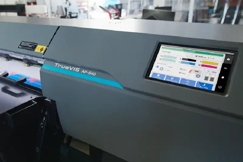 Image of printed canvas being hung on a wall