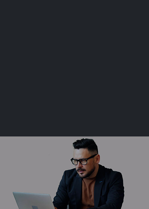 Man on laptop with support.