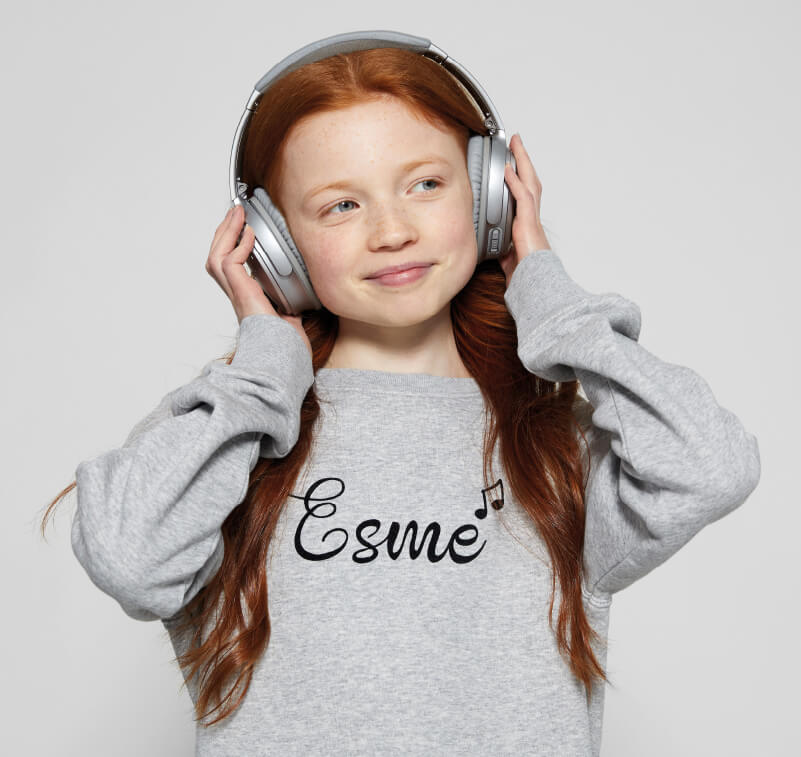Girl wearing a personalised sweatshirt