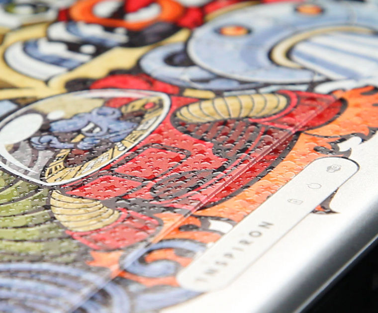 Print CMYK directly to laptop covers with special gloss highlight effects