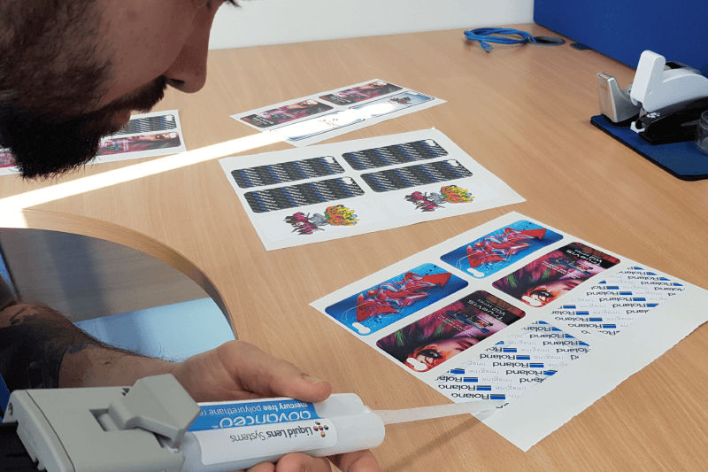 applying doming resin to cut graphics