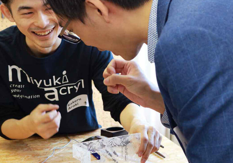 Acrylic is printed on using Roland UV LEF printers in advance before being bent to shape