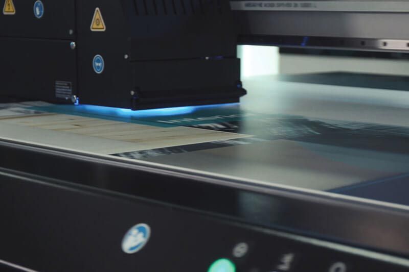 Printing directly to a board with a flatbed UV printer.