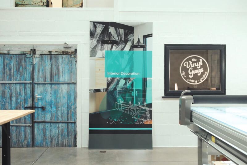Large format printed board in print workshop