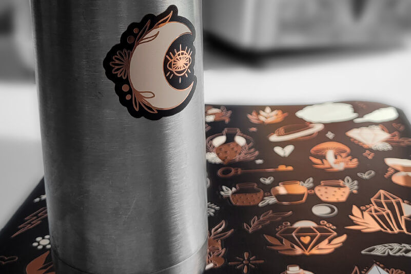 A water flask customised with a metallic sticker