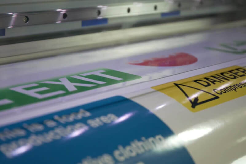 A wall sticker with a fire extinguisher colour code