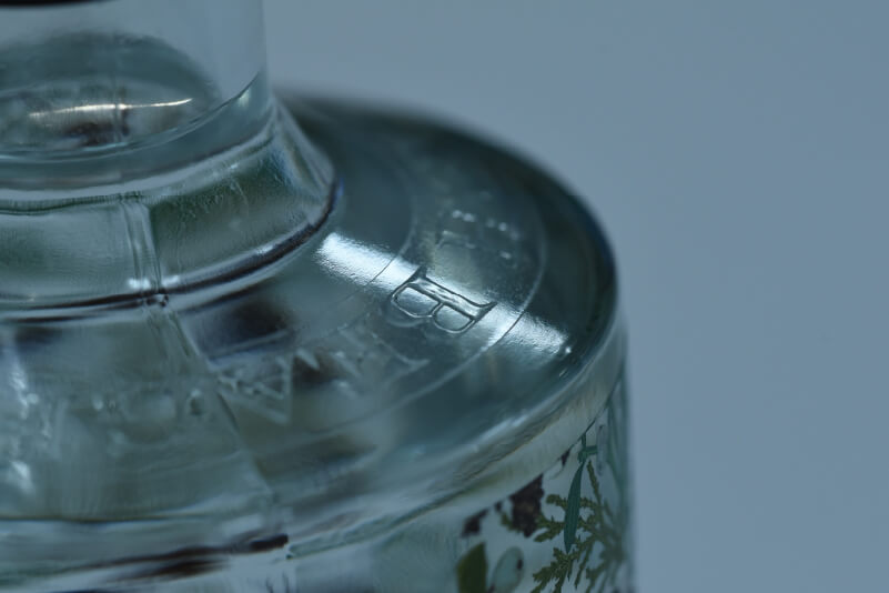 Close up of a gloss detail on a clear bottle sticker