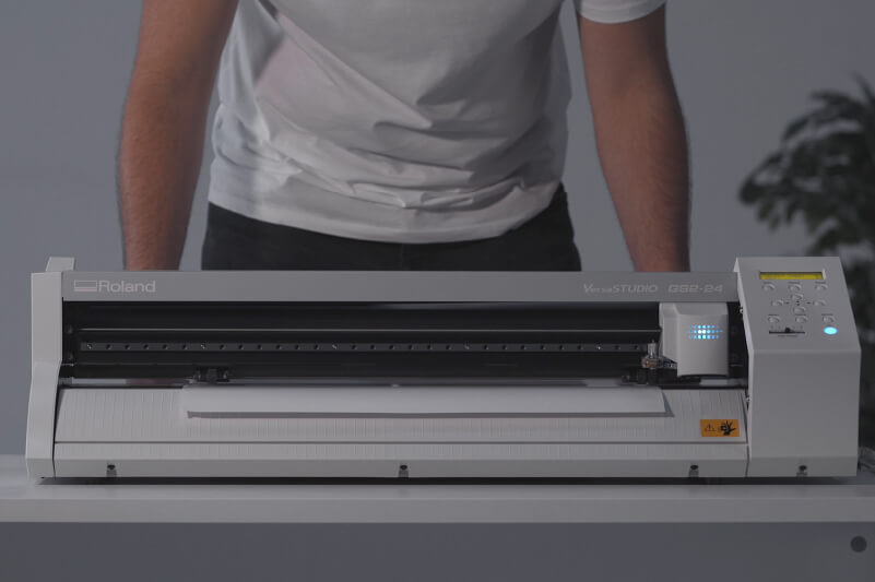 Loading flock material into a vinyl cutter