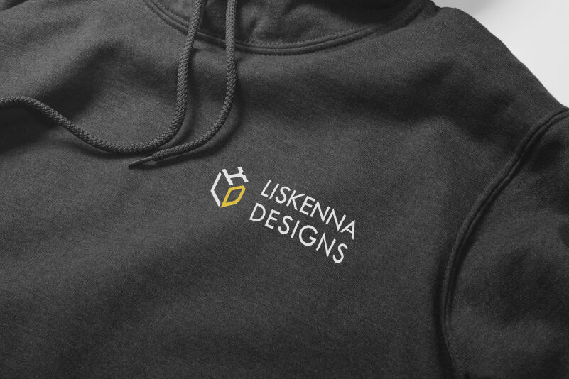 A black hoodie with a digitally printed logo