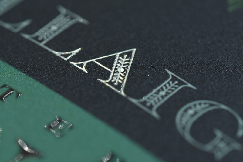 Metallic text produced by manipulating the white ink layer