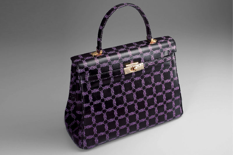 A printed leather handbag