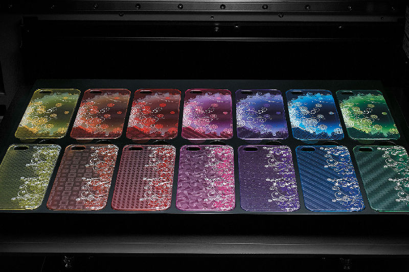 Phone cases lined up on a flatbed