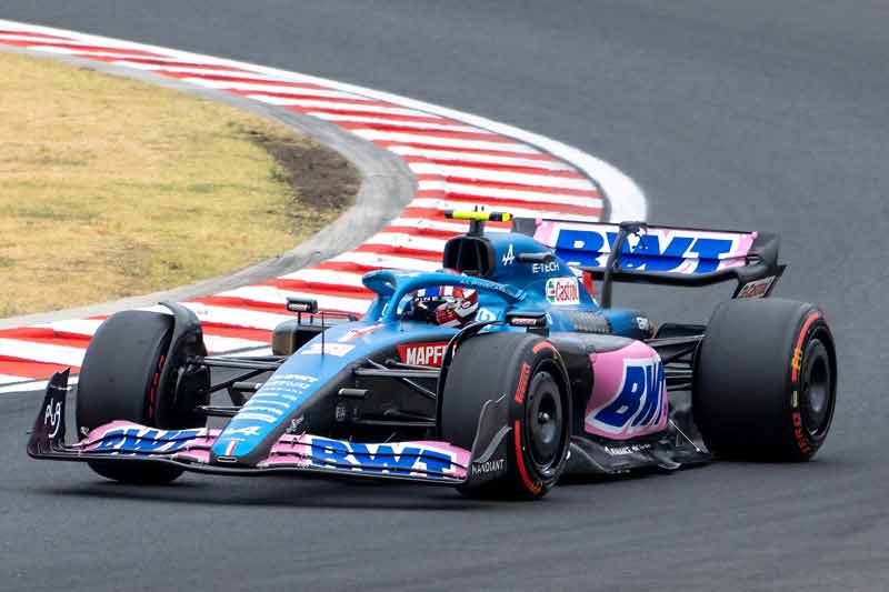 The Alpine F1 car wrapped in printed graphics