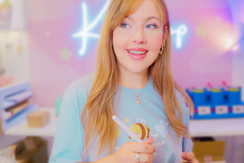 A person holding a pen