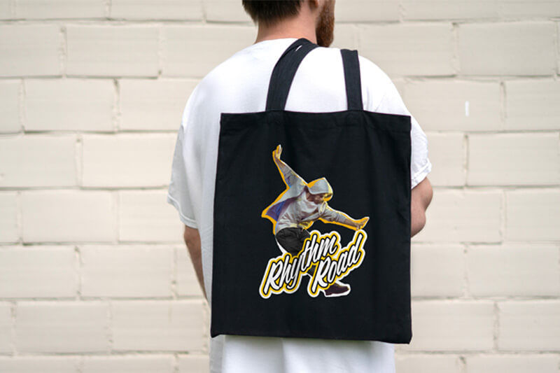 A tote bag decorated with a print and cut heat transfer vinyl 