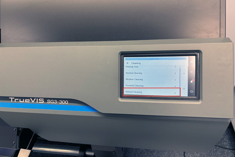 Select Manual Clean on your printer menu  