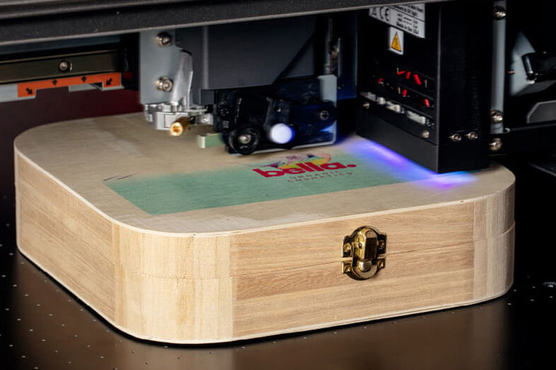 UV ink cures instantly on a wooden trinket box