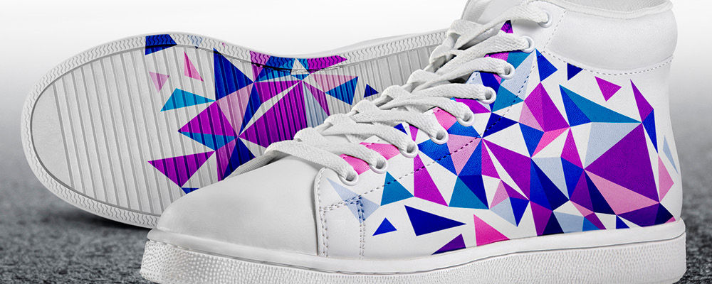 pair of trainers customised with abstract design 