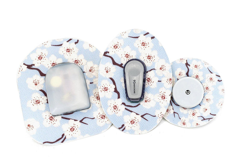 Diabetes device patches with floral design