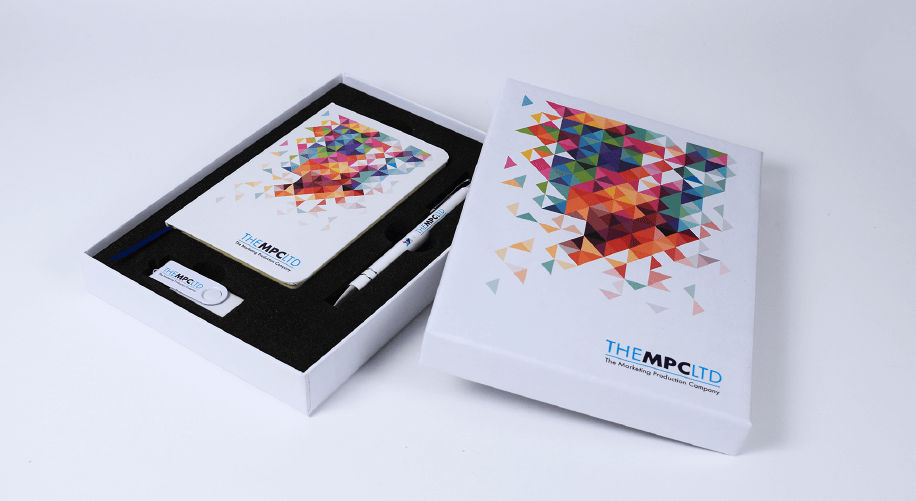 The Packaging Experts printing on notebook pen and usb stick