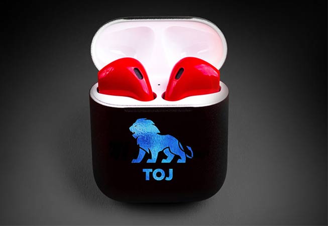 wireless earphones in charging case branded with a company logo