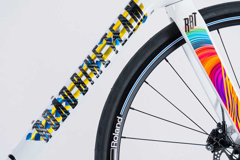 Bike race with multicolour stickers and wrapping