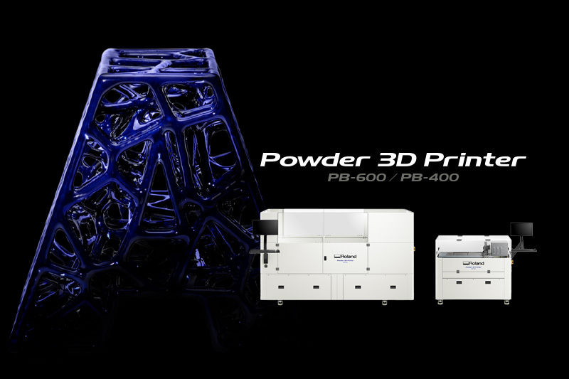 A Roland-certified engineer working on a printer