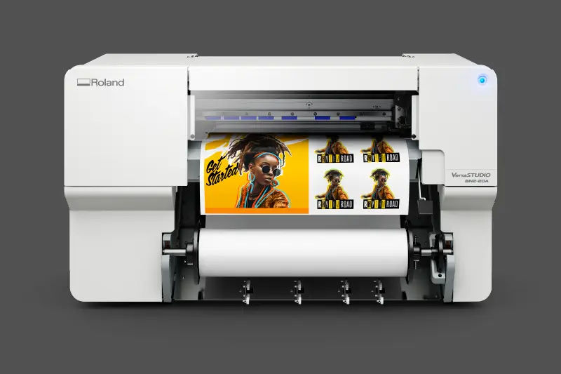 Roland VersaSTUDIO BN2-20A printer producing vibrant, high-quality labels with precise color and detail