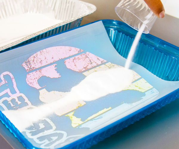 Aplicando S-POWDER sobre la tinta