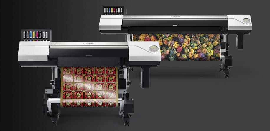 VersaUV LEC2-330 showing printed labels and LEC2-640 with printed trees image