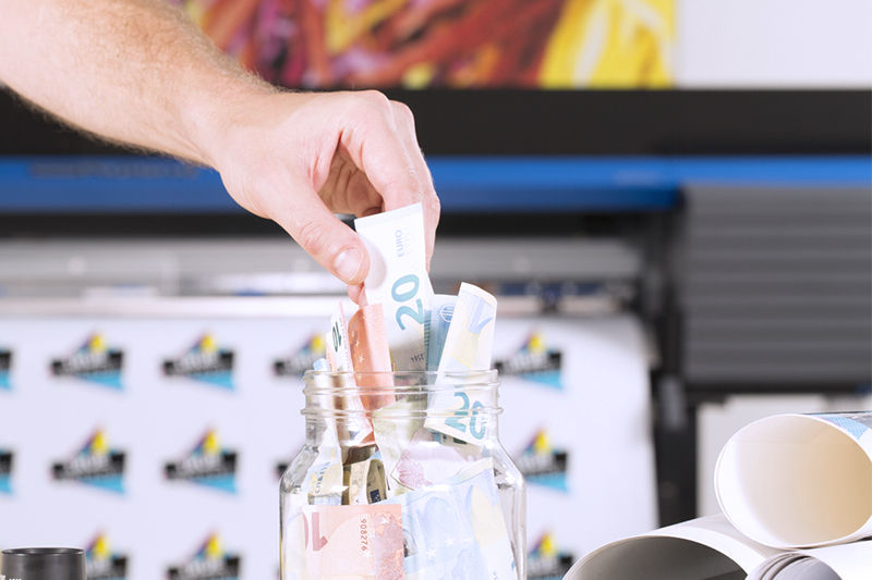 Image showing money saved in a jar